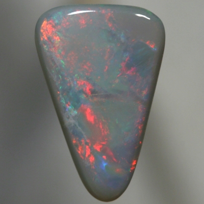 SOLID SEMI BLACK OPAL Rolling flashes of red and blue